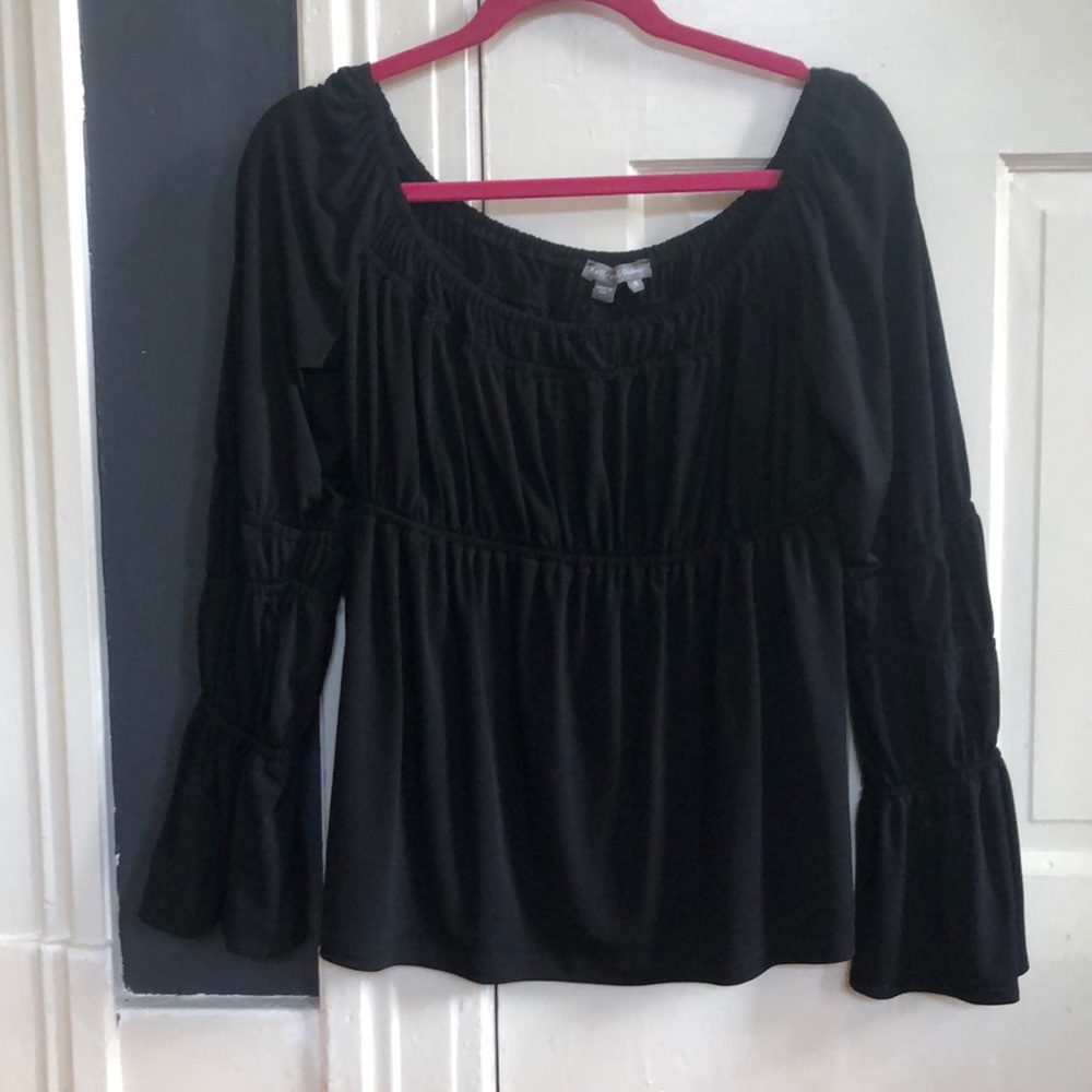 Black flirty top.